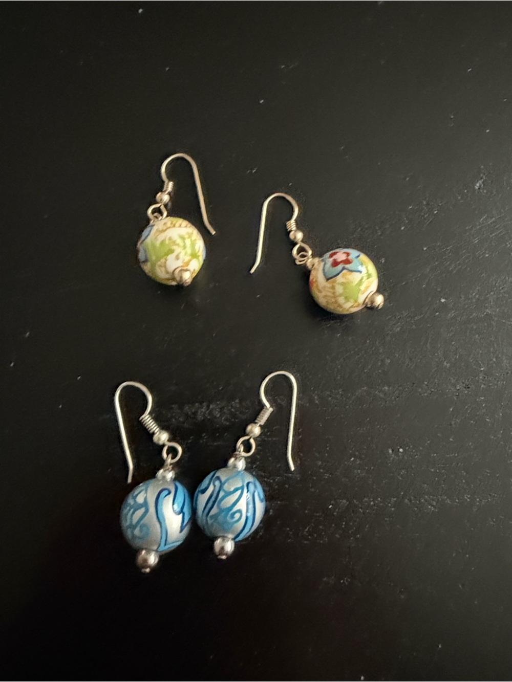 2 Pairs of Angela Moore Hand Painted Earrings-Floral yellow and Floral blue